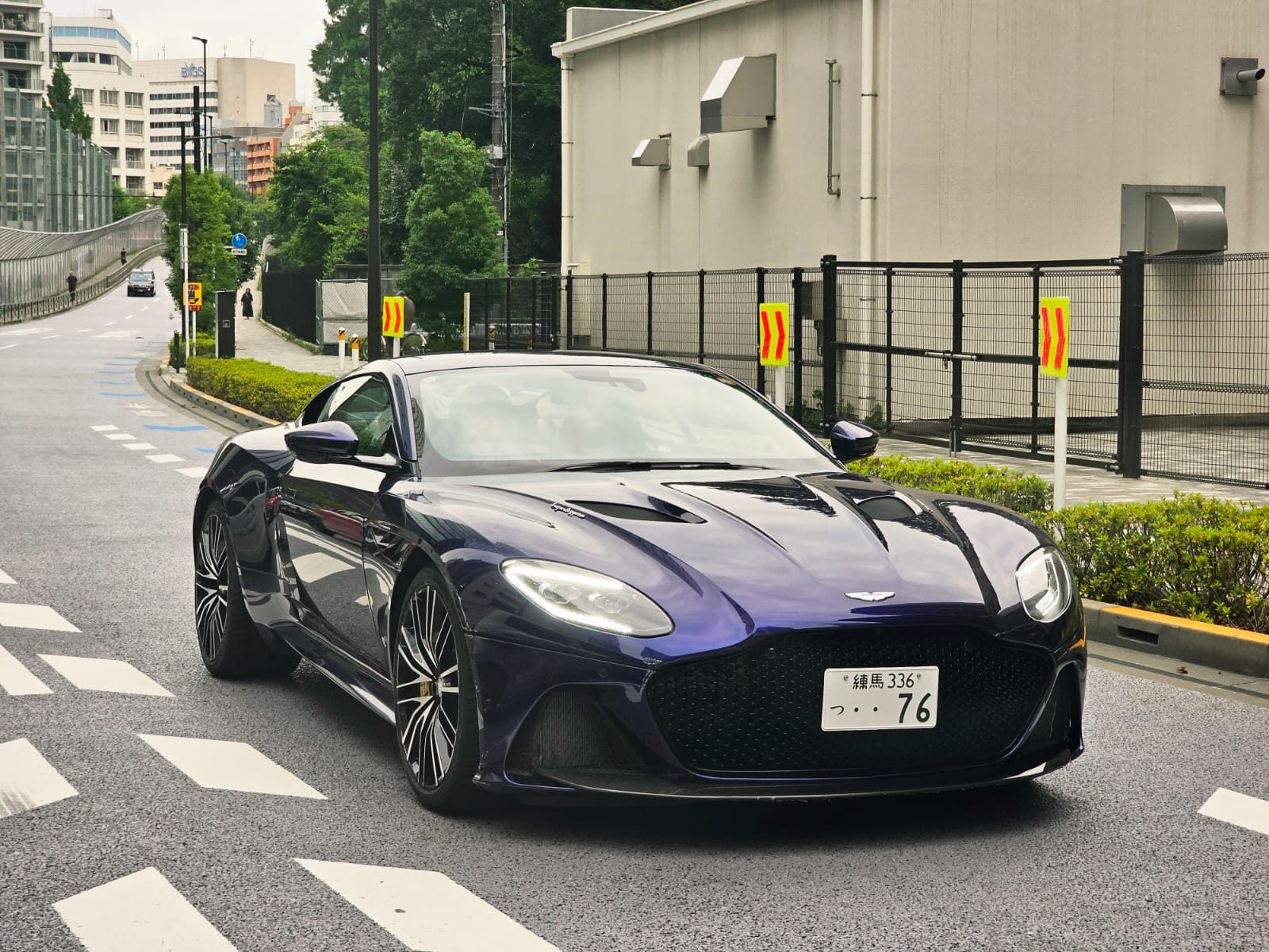 Dark purple Aston Martin DBS Superleggera on a Tokyo street